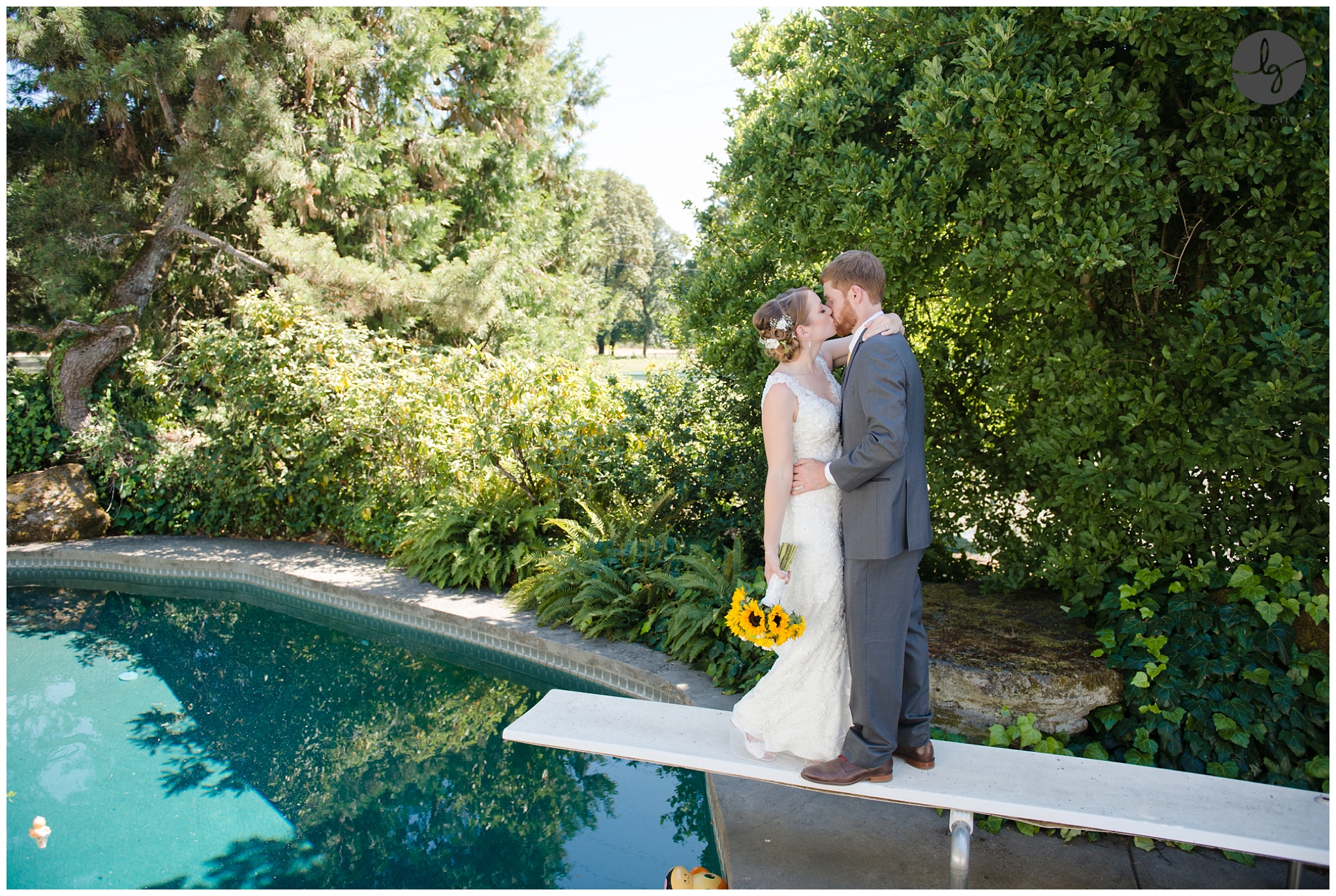 Outdoor wedding picture of bride and groom by the pool | Lydia Gillis Photography 
