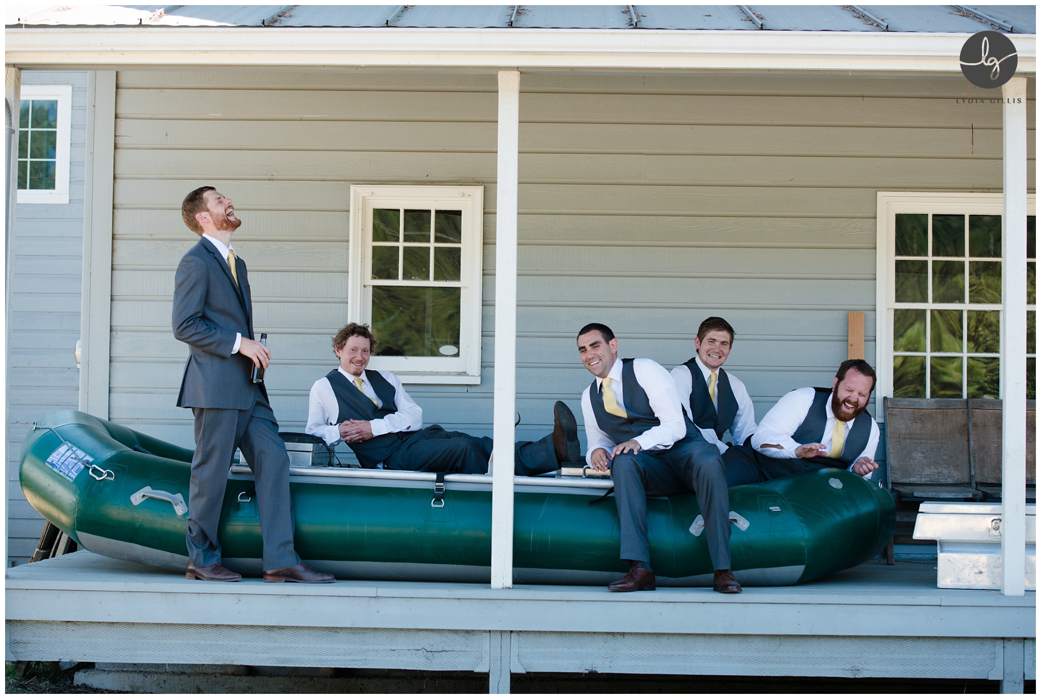 v,outdoor wedding, picture of wedding party sitting on a boat | Lydia Gillis Photography 