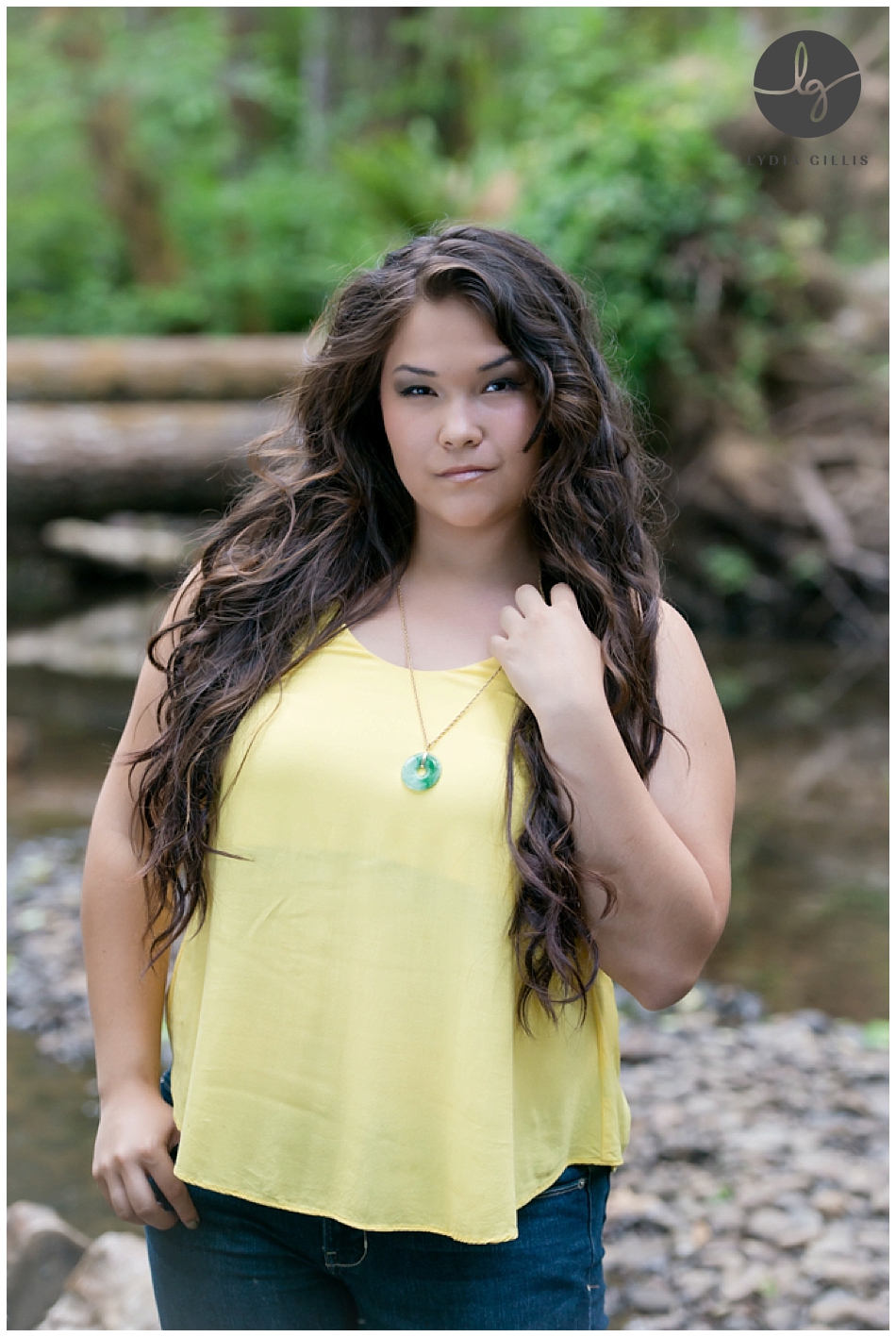 Senior girl in yellow blouse photographed by Eugene Senior photographer, Lydia Gillis at Alsea Falls in Oregon