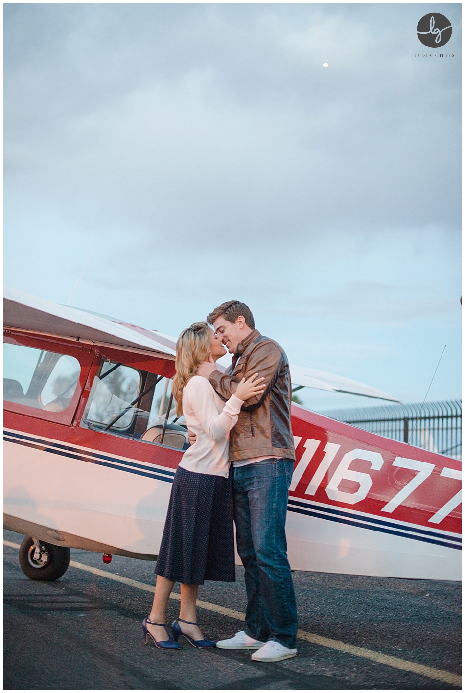 sunrise engagement session at an airfield 